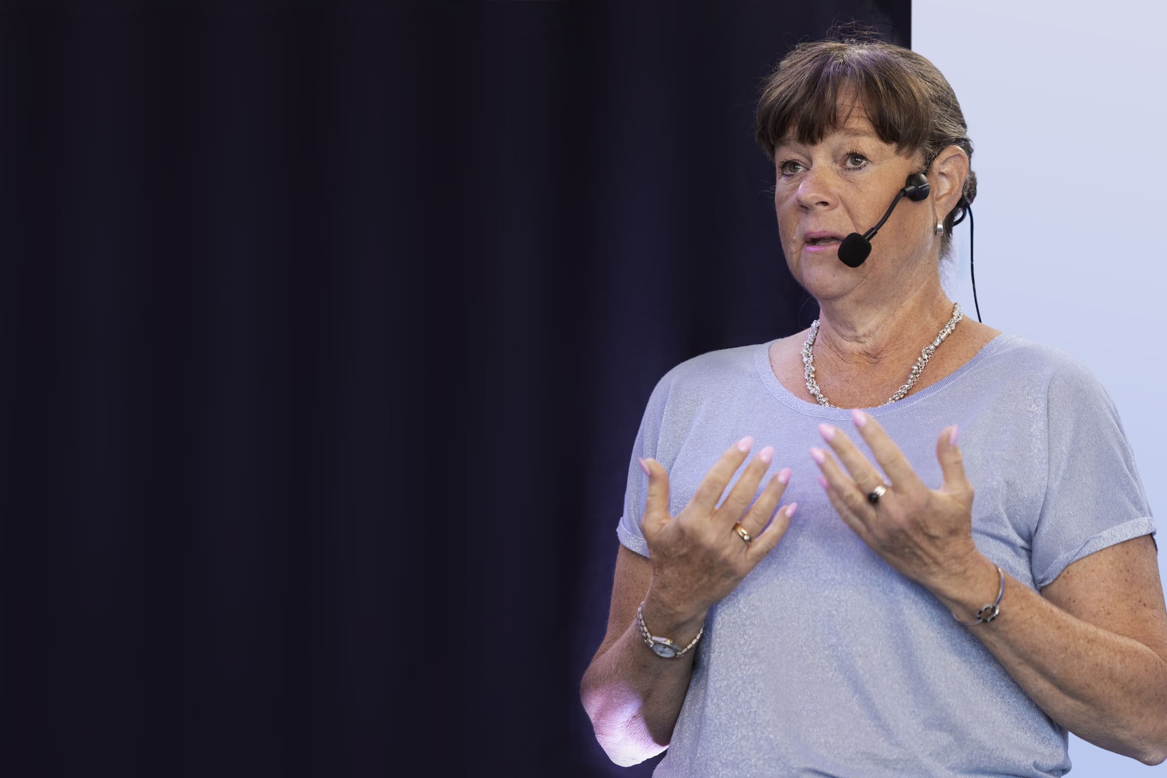 woman delivering a talk